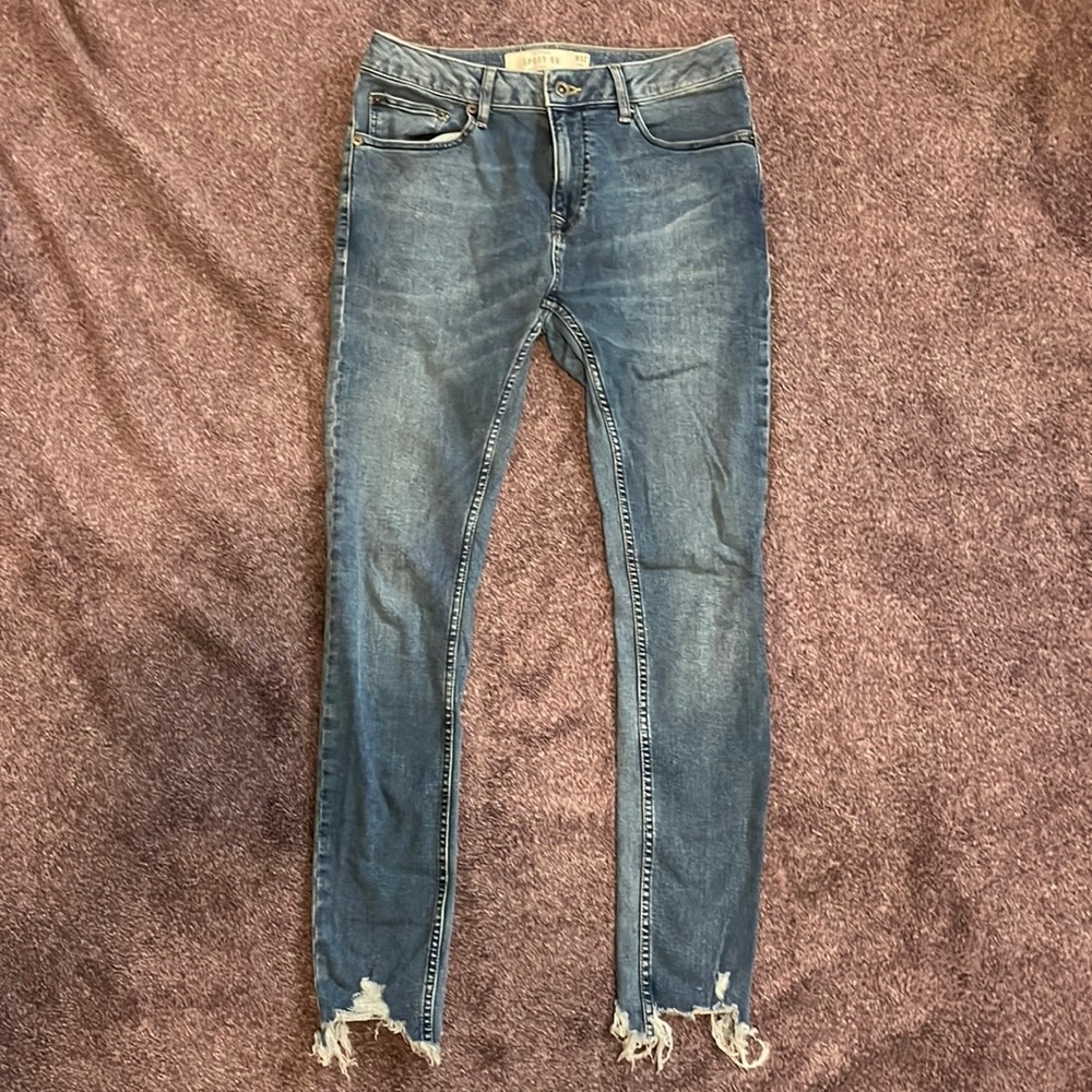 Topman spray on light blue skinny jeans with distressed ankles